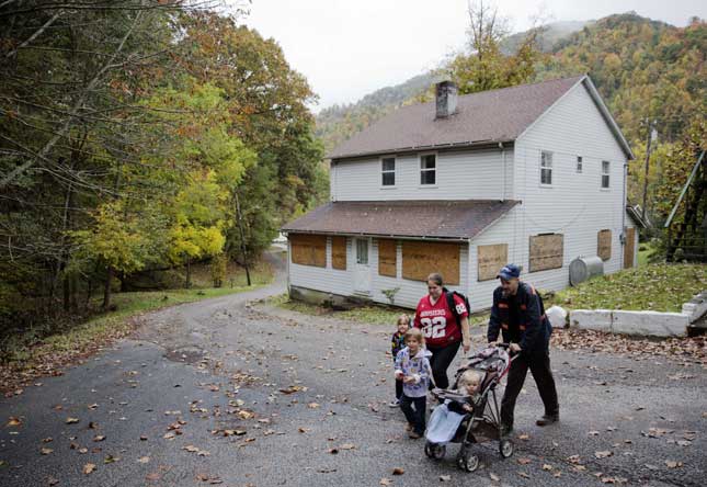 Based on an unproven belief that fossil fuels are a dire threat to humanity, arbitrary regulation is killing the Kentucky town of this out-of-work coal miner and his family. (DAVID GOLDMAN/AP PHOTO)