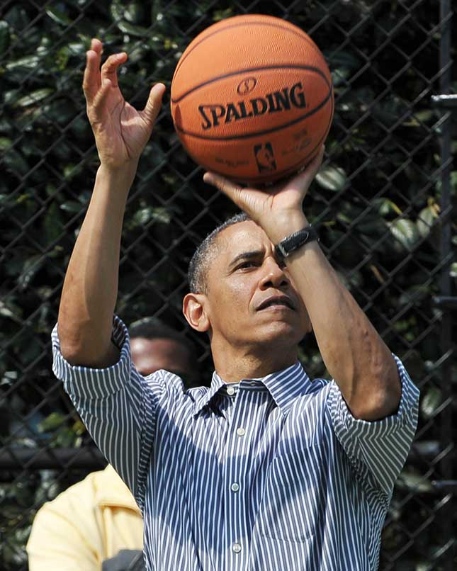 The basketball his father gave him as a present was his first clue in the quest that spanned Obama’s prep-school and college years: “to raise myself to be a black man in America.” (MANDEL NGAN/AFP/GETTY IMAGES)