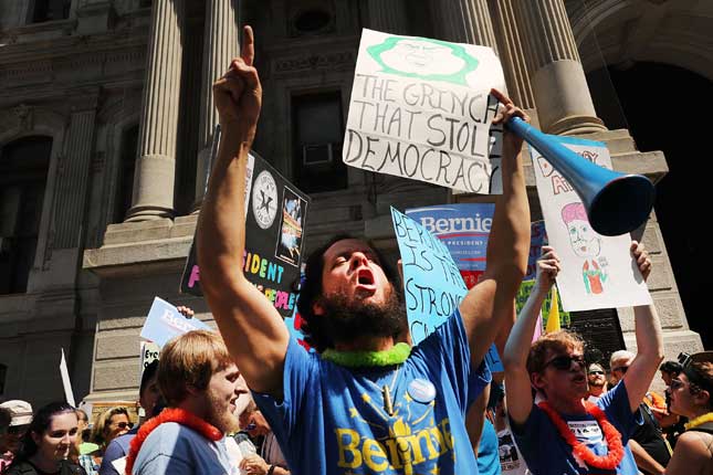 Embracing Sanders’s radical agenda, young Democrats overwhelmingly preferred him to Clinton. (SPENCER PLATT/GETTY IMAGES)