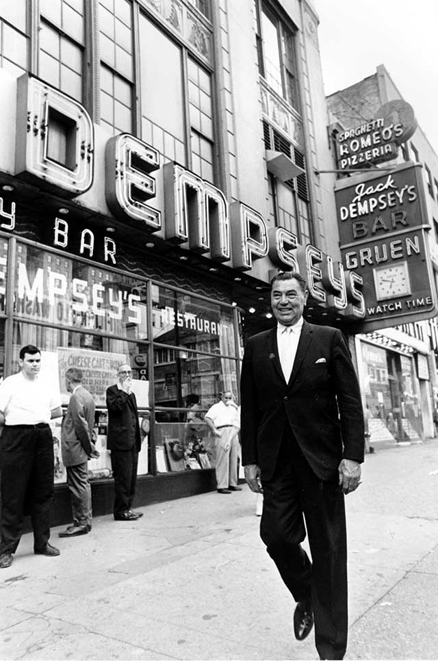 Jack Dempsey in front of his iconic Broadway restaurant, 1963 (AP PHOTO)