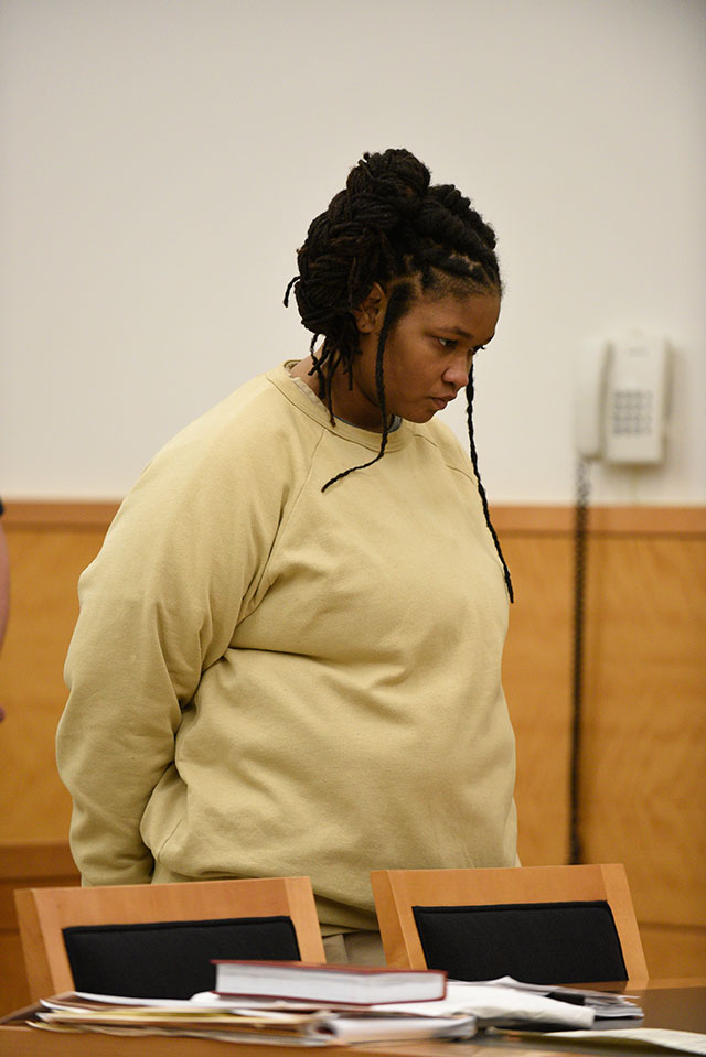 Zarah Coombs at a court appearance after being charged with beating to death her four-year-old son, Zamair, with a broomstick (BARRY WILLIAMS)