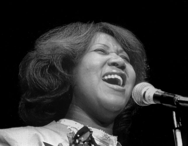 Aretha Franklin performing at a 1980 benefit for her father, Reverend C. L. Franklin, long-time pastor of New Bethel Baptist Church, once located in Black Bottom (Leni Sinclair/ Michael Ochs Archives/Getty Images)