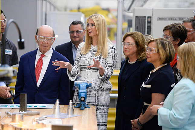 U.S. Secretary of Commerce Wilbur Ross and senior advisor to the president Ivanka Trump join company CEO Barbara Humpton (to right of Trump) at a Siemens USA facility. (DAVID T. FOSTER III/CHARLOTTE OBSERVER/TNS/ALAMY STOCK PHOTO)