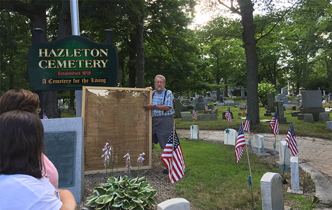 John Probert, president of the Hazleton Cemetery Association, leading a historic tour of the city's Vine Street Cemetery