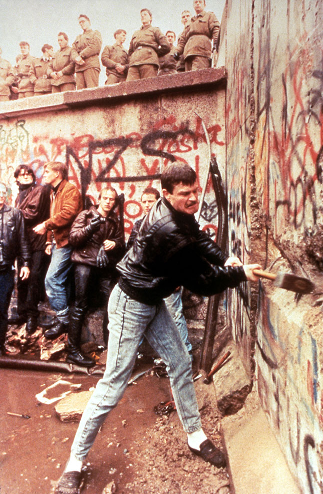 After the fall of the Berlin Wall in 1989, Europe sought to retire from history—but history is now grabbing Europeans by the collar. (Photo: Pictorial Press Ltd / Alamy Stock Photo)