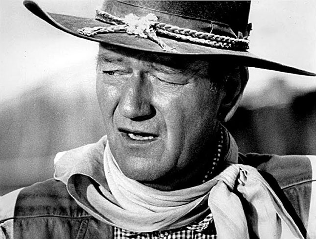 A publicity still of John Wayne in "The Comancheros" (1961)