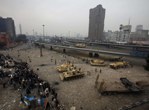 Demonstrators confront pro-Mubarak forces in Cairo's Tahrir Square.