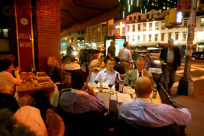 A crowded restaurant in Manhattan's Meatpacking District, one of many neighborhoods that revived under Republican mayor Rudy Giuliani.